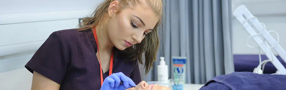 student looking down on eyebrows
